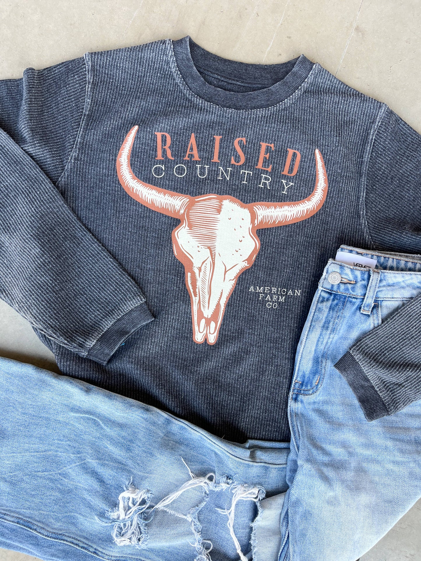 ‘Raised Country’ Washed Black Ribbed Crew Fall 2024 Western