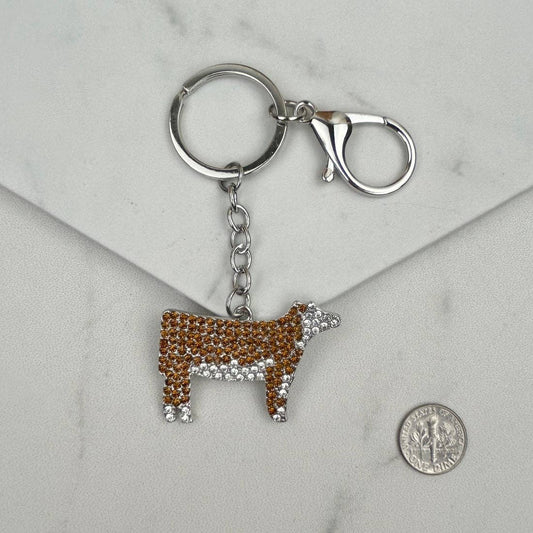Clear and brown crystal cow keychain